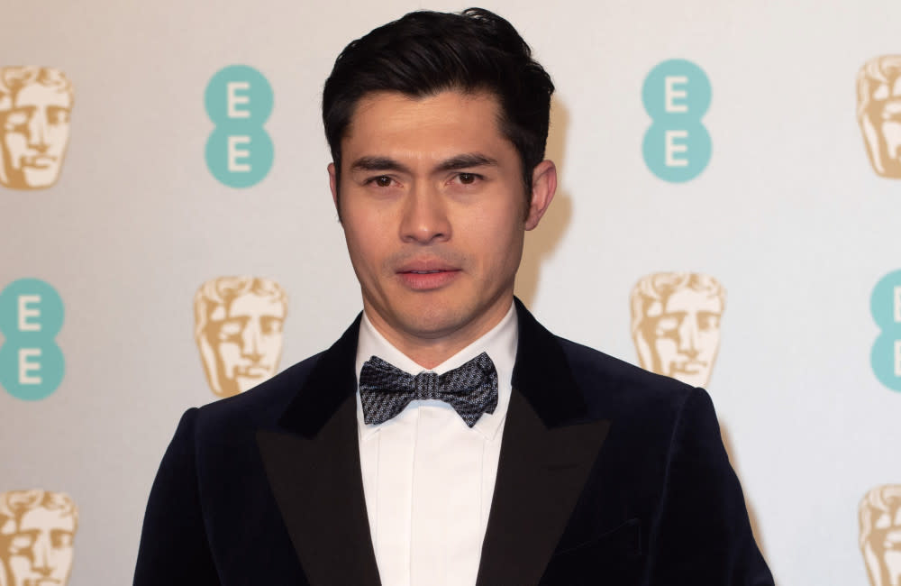 Henry Golding has confessed to talking to himself credit:Bang Showbiz