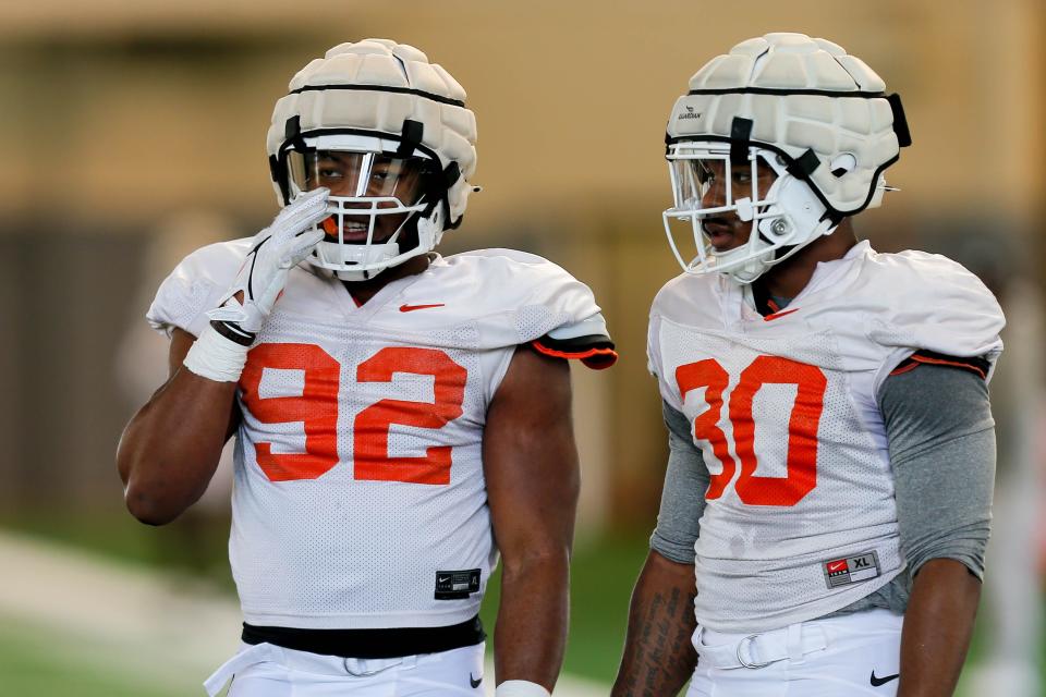 Obi Ezeigbo (92) runs drills during a Oklahoma State football practice, in Stillwater, Okla., on Tuesday, April 2, 2024.