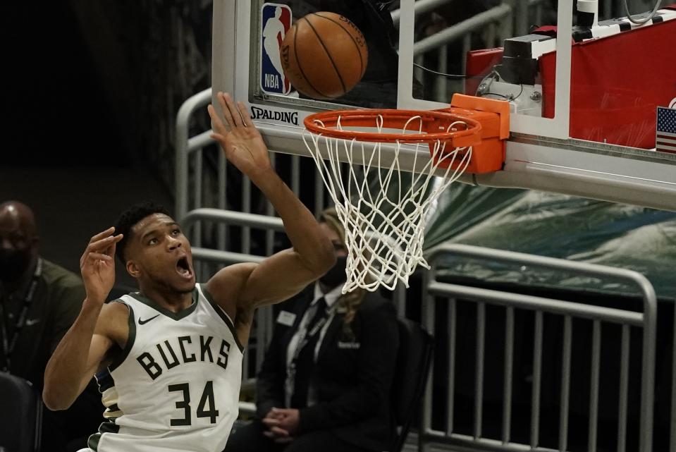 Milwaukee Bucks' Giannis Antetokounmpo shoots during the first half of an NBA basketball game against the Minnesota TimberwolvesTuesday, Feb. 23, 2021, in Milwaukee. (AP Photo/Morry Gash)