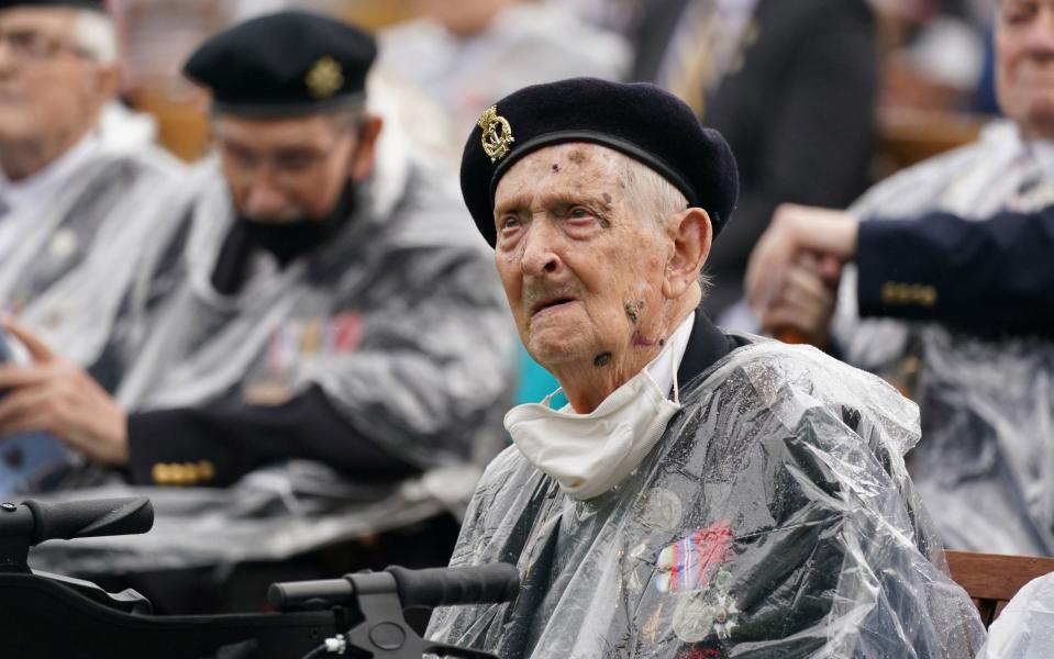 Veterans watch the official opening of the British Normandy Memorial in France via a live feed during a ceremony at the National Memorial Arboretum in Alrewas, Staffordshire -  Jacob King/PA