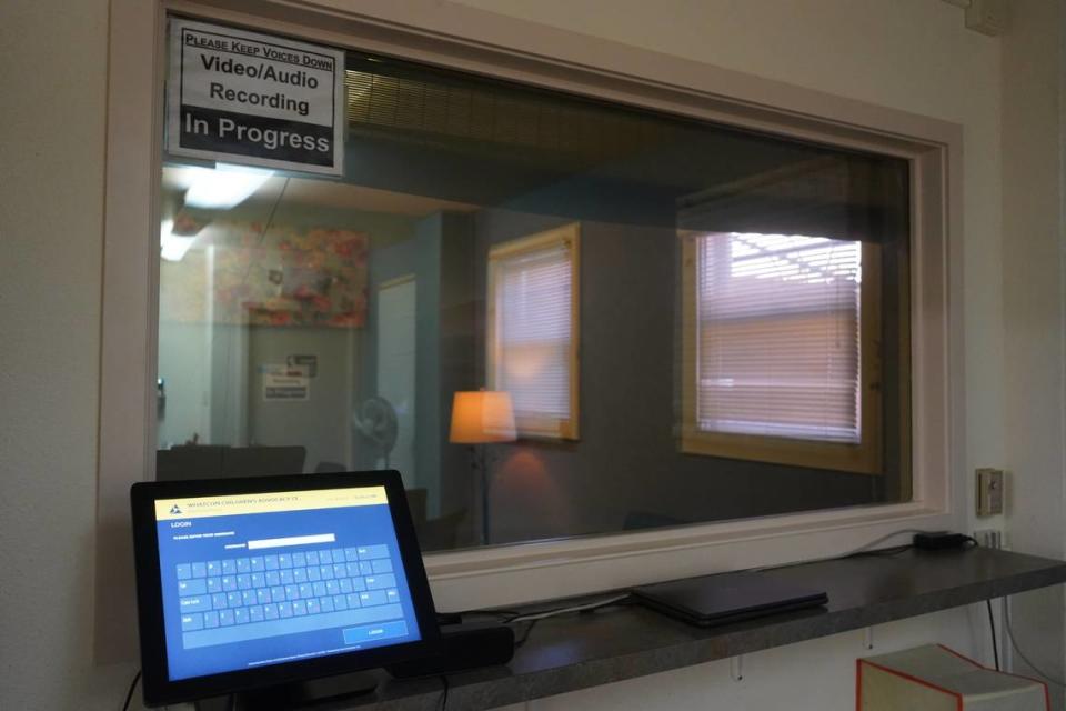 A room in the Brigid Collins Family Support Center is ready to facilitate a child forensic interview of children who may have experienced abuse or neglect on July 18, 2023, in Bellingham, Wash. A two-way glass window allows child welfare caseworkers and law enforcement officers to watch the interview and gather necessary information.