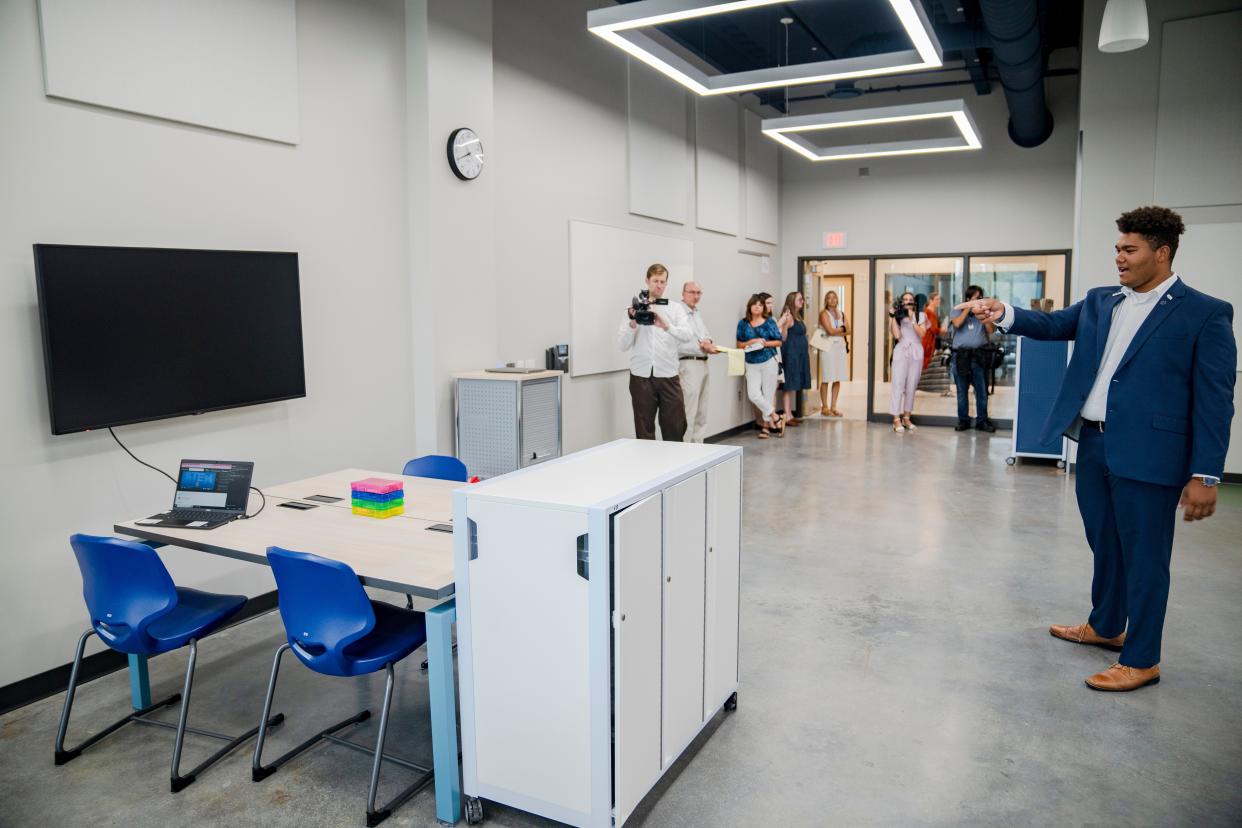 Boys Town Mayor Jafar Liebers, right, gives a tour of the new Boys Town Education Center, Thursday, Aug. 3, 2023.