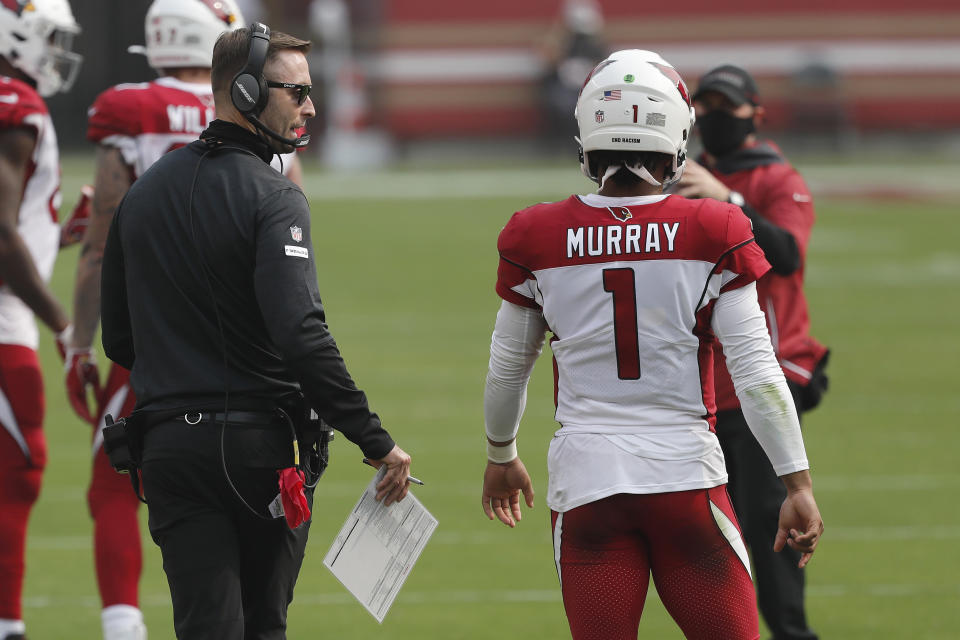 Arizona Cardinals head coach Kliff Kingsbury talks with quarterback Kyler Murray (1) during the second half of an NFL football game against the San Francisco 49ers in Santa Clara, Calif., Sunday, Sept. 13, 2020. (AP Photo/Josie Lepe)