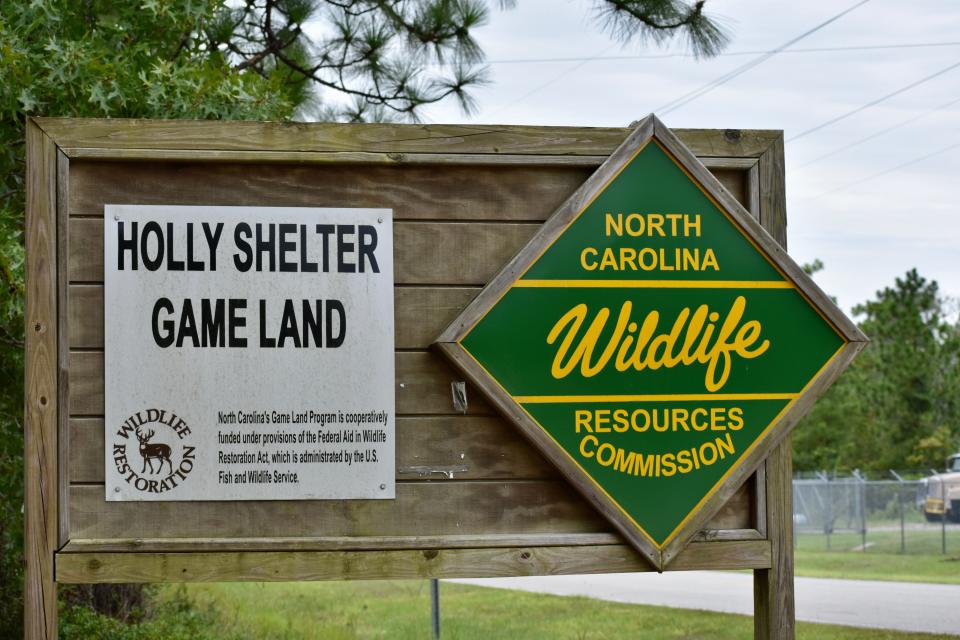 Members of the North Carolina Forest Service are on the scene of a wildfire in the Holly Shelter Game Land on Aug. 11, 2022, in Pender County.