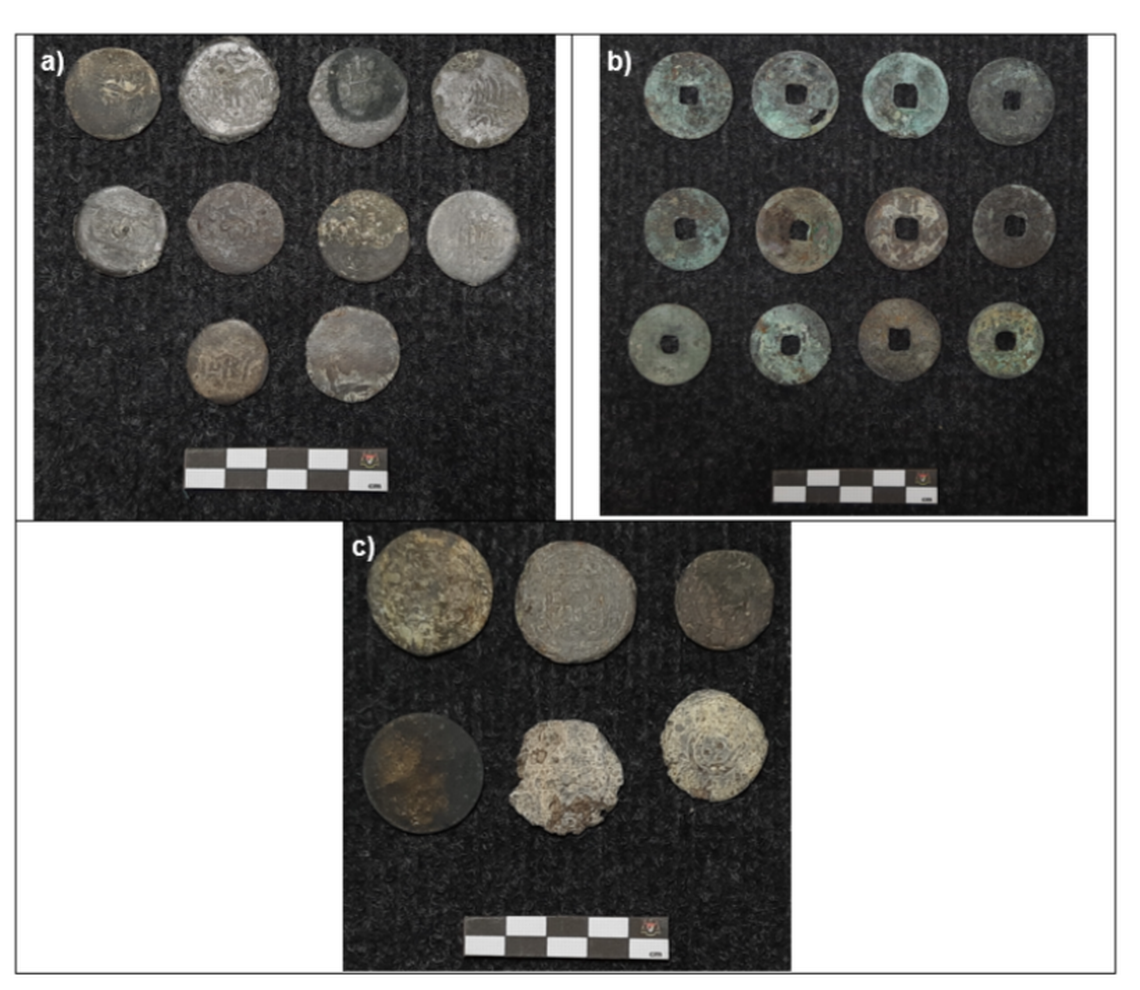 A collection of coins, including ones from China and Portugal, discovered at the site Photo from Research Square