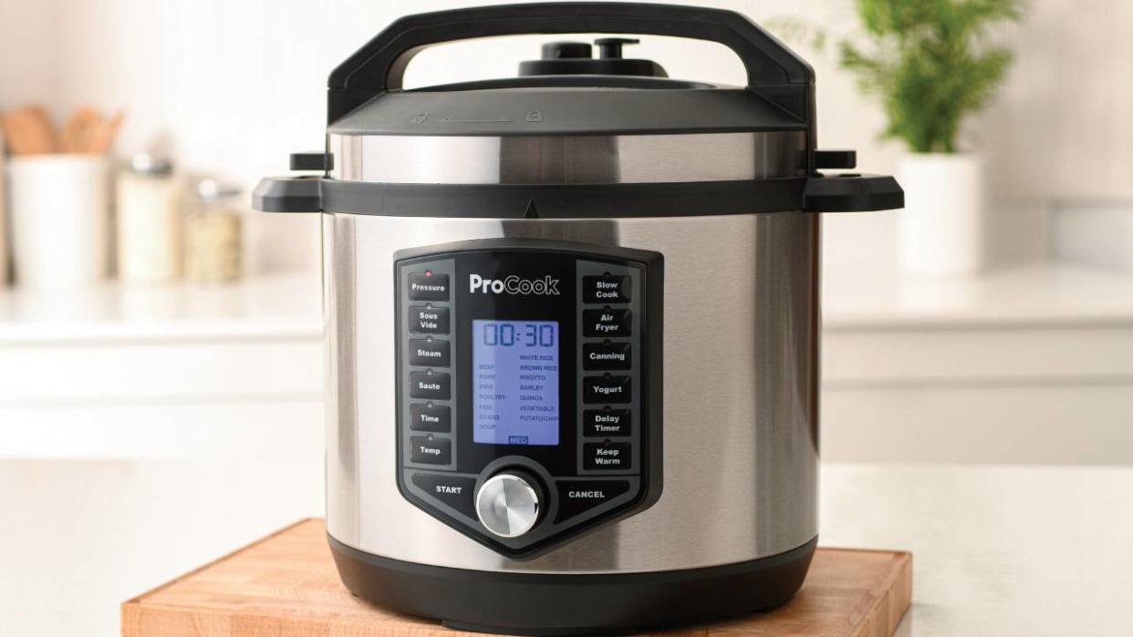 Lifestyle image of the ProCook Electric Pressure Cooker and Air Fryer. 