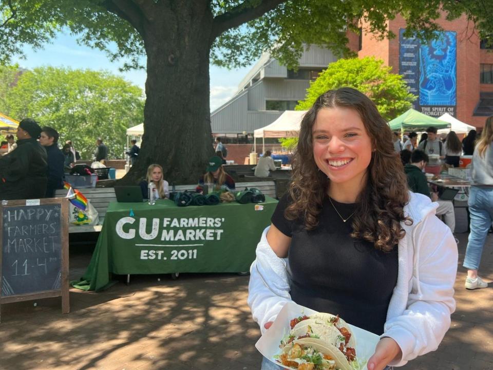 Emma Ginsberg at Georgetown's farmer's market