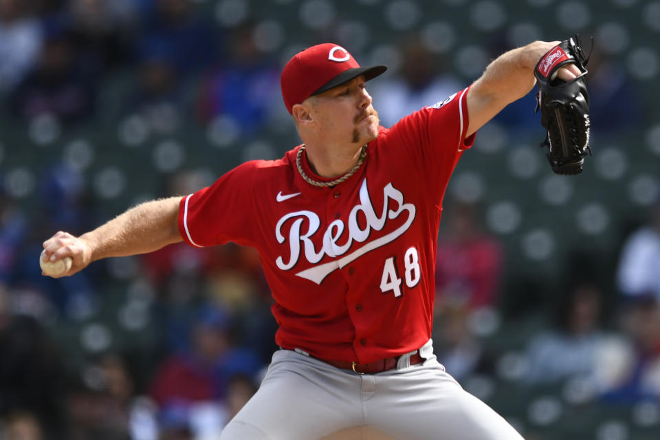Cincinnati Reds starter Chase Anderson delivers a pitch during the first inning of a baseball game against the Chicago Cubs, Sunday, Oct. 2, 2022, in Chicago. (AP Photo/Paul Beaty)