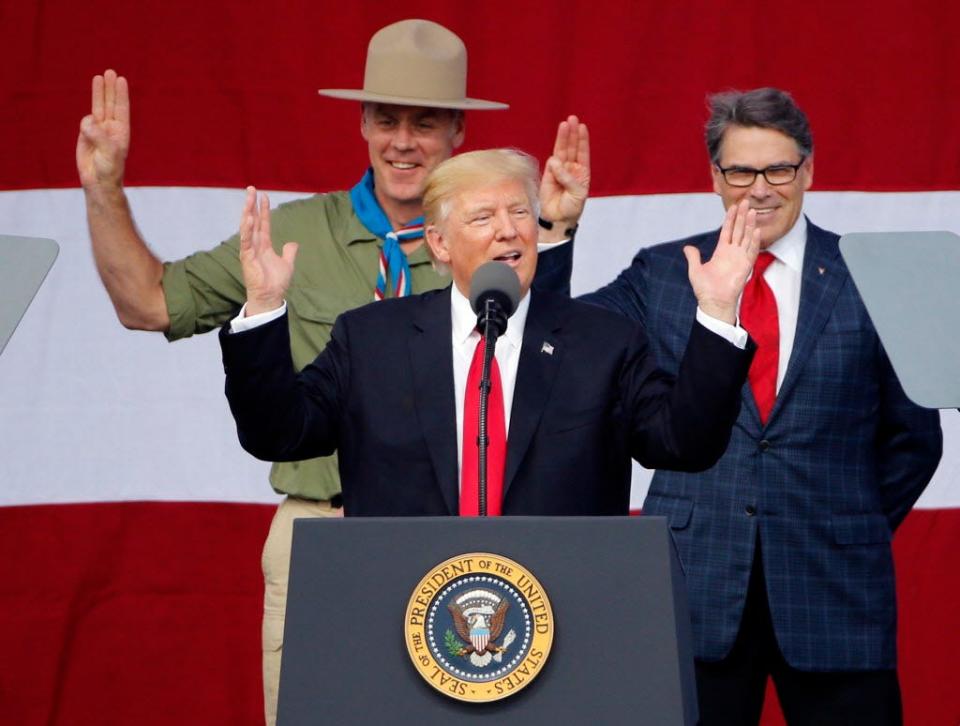 President Trump, front left, gestures as former Boy