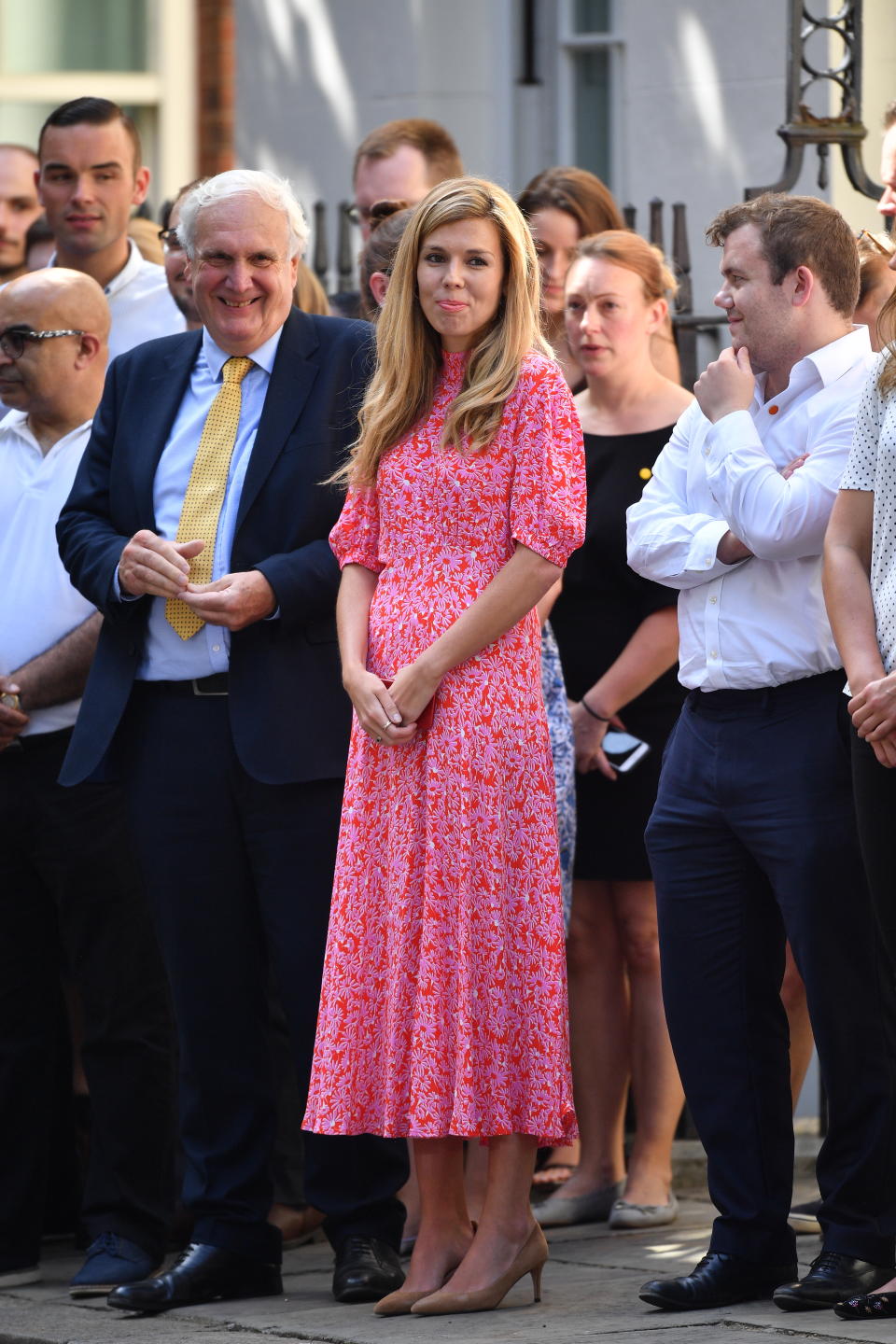 Carrie Symonds wearing a Ghost dress on Downing Street in July [Photo: Getty Images]