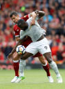 <p>Romelu Lukaku tries to get the better Liverpool’s Dejan Lovren</p>