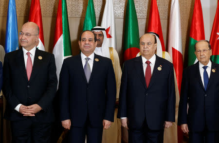 Iraq's President Barham Salih, Egyptian President Abdel Fattah al-Sisi, Yemeni President Abd-Rabbu Mansour and Lebanese President Michel Aoun pose during the group photo with Arab leaders, ahead of the 30th Arab Summit in Tunis, Tunisia March 31, 2019. REUTERS/Zoubeir Souissi/Pool