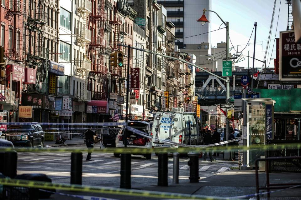 New York Police Department officers investigate the scene of an attack in Manhattan's Chinatown neighborhood, Saturday, Oct. 5, 2019 in New York.