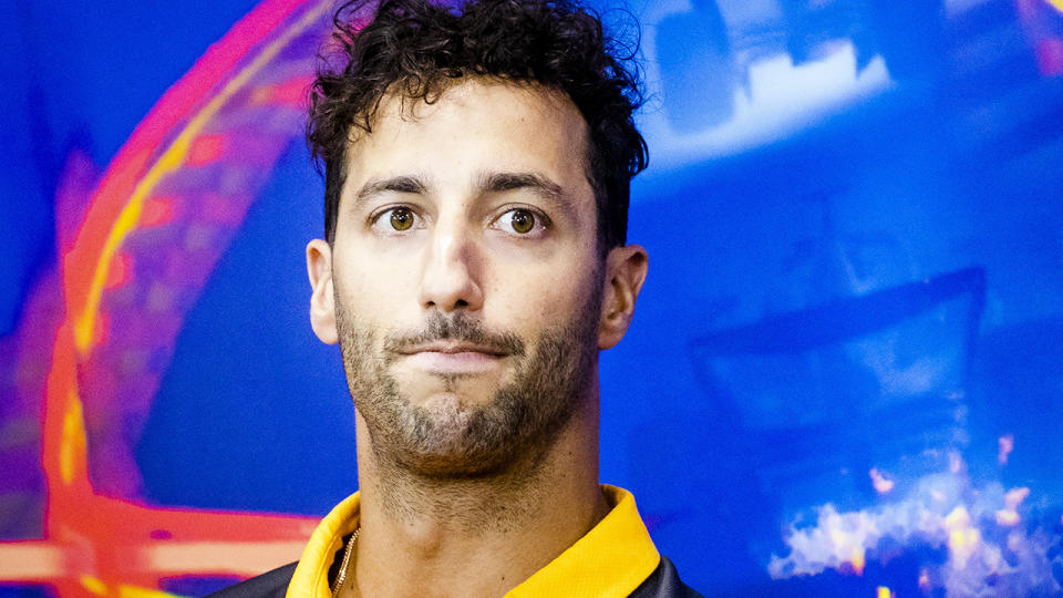 Daniel Ricciardo listens during a F1 press conference after his McLaren exit was announced.