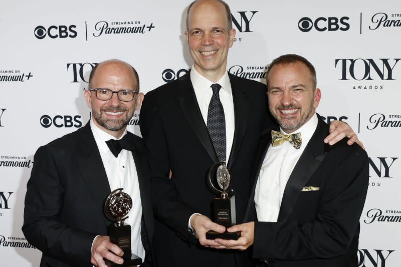 Left to right, Hank Unger, Matthew Rego and Michael Rego, winners of the "Best Musical" award for "The Outsiders" holds their Tony Awards in the press room at the Tony Awards at David H. Koch Theater at Lincoln Center for the Performing Arts on Sunday in New York City. Photo by Peter Foley/UPI