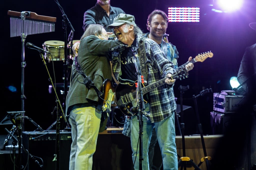 LOS ANGELES, CALIFORNIA - APRIL 22: (L-R) Stephen Stills, Neil Young and Chris Stills perform at the Autism Speaks Light Up The Blues 6 Concert at The Greek Theatre on April 22, 2023 in Los Angeles, California. (Photo by Harmony Gerber/Getty Images)