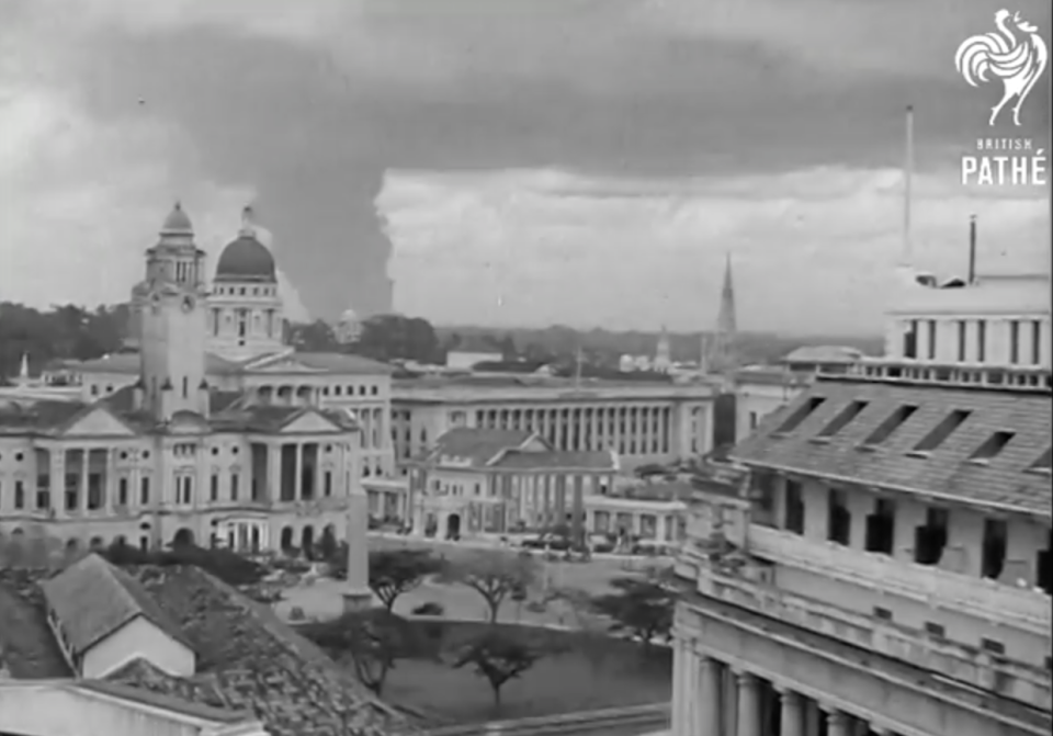 A large column of smoke seen in Singapore following a Japanese air raid on the city on 8 December 1941. (SCREENSHOT: British Pathe/YouTube)