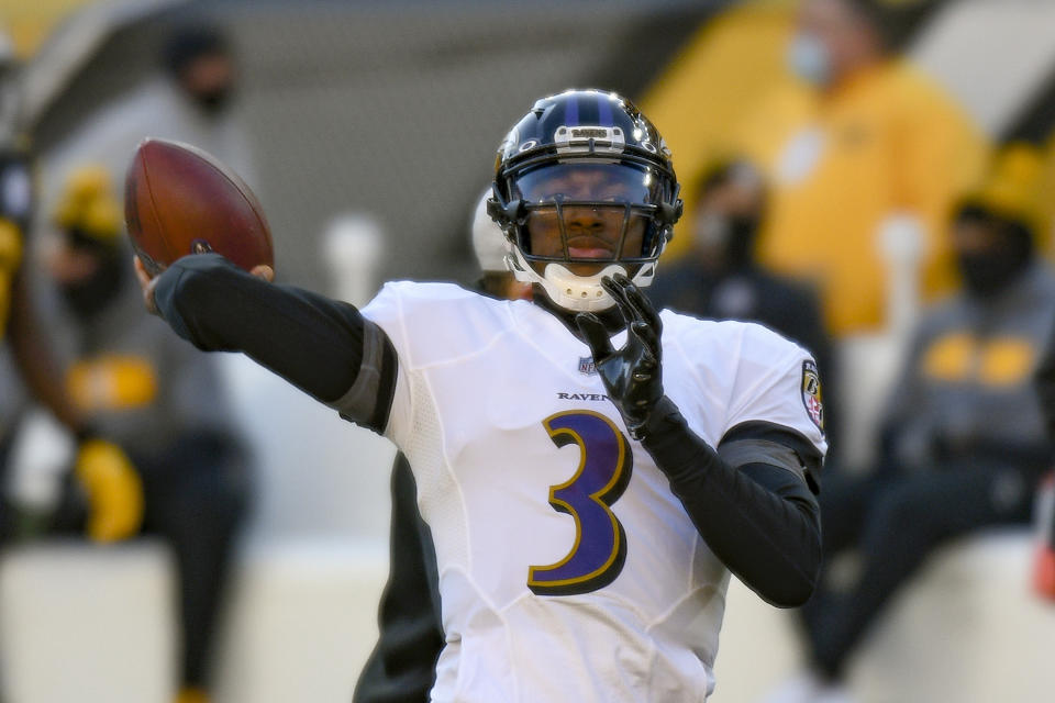 Baltimore Ravens quarterback Robert Griffin III (3) warms up before an NFL football game against the Pittsburgh Steelers, Wednesday, Dec. 2, 2020, in Pittsburgh. (AP Photo/Don Wright)