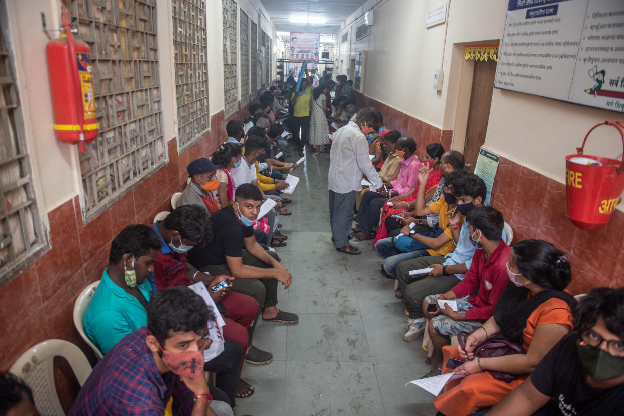 MUMBAI, INDIA - SEPTEMBER 8: Beneficiaries wait in a queue to get inoculated against Covid-19 during a free vaccination camp at Matunga (West), on September 8, 2021 in Mumbai, India. (Photo by Pratik Chorge/Hindustan Times via Getty Images)
