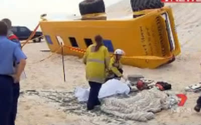 A tour bus carrying Singaporean tourists rolled down a sand dune north of Perth, leaving five people injured. (Seven News photo)