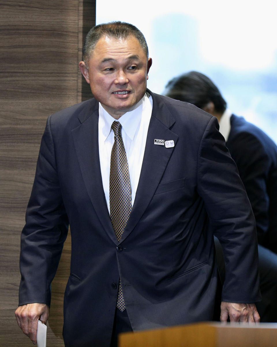 Former gold medalist Yasuhiro Yamashita arrives for a press conference in Tokyo, Thursday, June 27, 2019. Yamashita has been elected to lead the Japanese Olympic Committee, which is mired in a scandal that forced the former president to step aside in an alleged vote-buying scheme to land next year's Tokyo Games. (Kenzaburo Fukuhara/Kyodo News via AP)