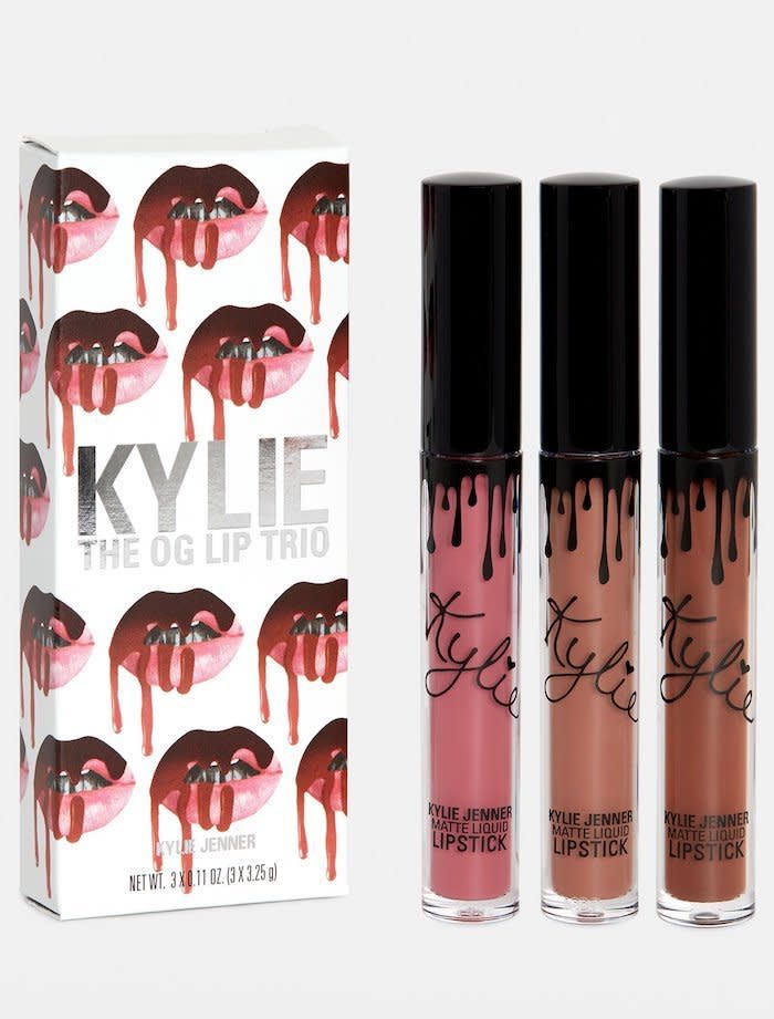 Kylie Jenner's lip kits are her bread and butter, so if you're going to contribute to her riches, that's the way to go. The matte lipsticks can be a tad drying, but they're highly pigmented and long-lasting. If you're not a fan of the matte finish, Kylie's <a href="https://www.kyliecosmetics.com/collections/gloss" target="_blank">lip glosses</a> are also a good option.&nbsp;<strong><br /><a href="https://www.kyliecosmetics.com/collections/matte-lip-kits/products/copy-of-posie-k-trio-lip-set" target="_blank"><br />Kylie Cosmetics OG Trio Lip Set</a>, $36</strong>