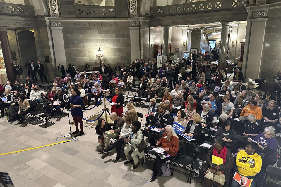 About 100 advocates gathered Tuesday, Jan. 30, 2024, at the Missouri Capitol in Jefferson City, Mo., to fight lawmaker efforts to make it harder to amend Missouri's constitution. (AP Photo/Summer Ballentine)