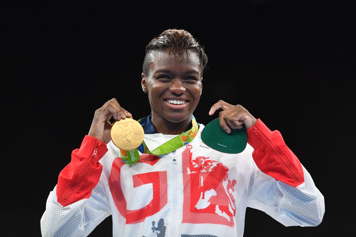 Great Britain's Nicola Adams poses on the podium with a gold medal during the Rio 2016 Olympic Games at the Riocentro - Pavilion 6 in Rio de Janeiro on August 20, 2016.   / AFP PHOTO / Yuri CORTEZ        (Photo credit should read YURI CORTEZ/AFP via Getty Images)