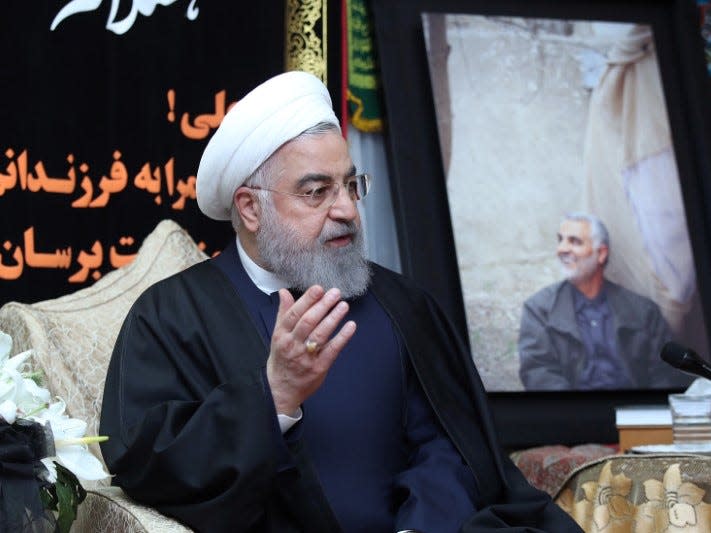 FILE PHOTO: Iranian President Hassan Rouhani visits the family of the Iranian Major-General Qassem Soleimani, head of the elite Quds Force, who was killed by an air strike in Baghdad, at his home in Tehran, Iran January 4, 2020. Official President Website/Handout via REUTERS