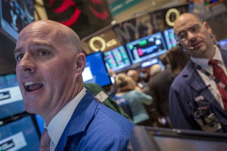 Specialist trader John O'Hara gives a price on the floor of the New York Stock Exchange December 10, 2013. REUTERS/Brendan McDermid