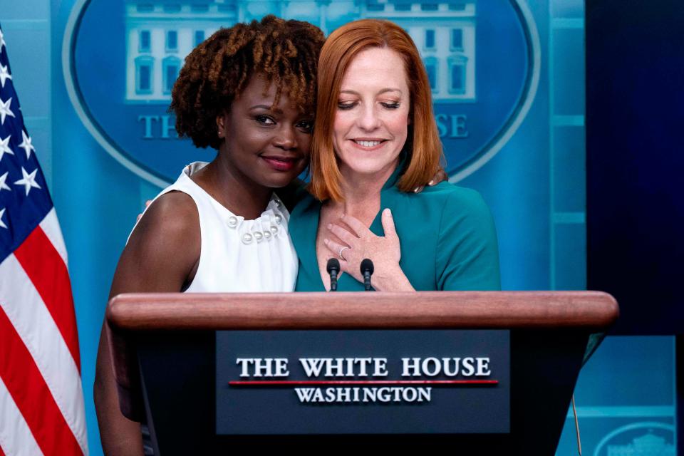 White House Press Secretary Jen Psaki (R) is hugged by current Principal Deputy Press Secretary Karine Jean-Pierre during a press briefing in the Brady Press Briefing Room of the White House.