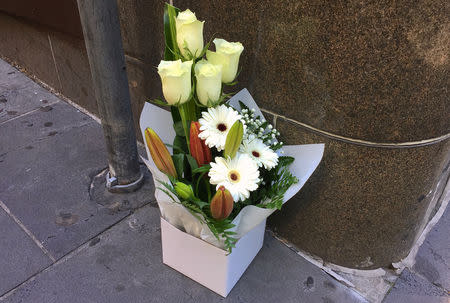 A box of flowers is seen at the site a day after where a man killed one person in what authorities said was a terrorist attack, near the Bourke Street mall in central Melbourne, Australia, November 10, 2018. REUTERS/Melanie Burton