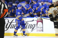 Buffalo Sabres forward Arttu Ruotsalainen (25) is congratulated after a goal during the second period of the team's NHL hockey game against the Boston Bruins, Thursday, April 22, 2021, in Buffalo, N.Y. (AP Photo/Jeffrey T. Barnes)