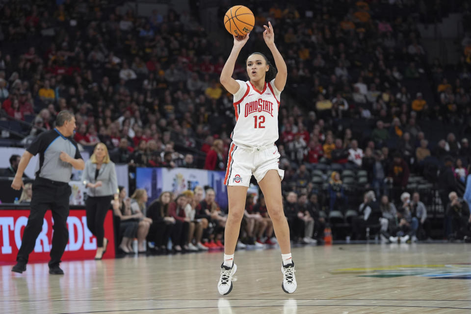 Ohio State guard Celeste Taylor (12) shoots during the second half of an NCAA college basketball game against Maryland in the quarterfinals of the Big Ten women's tournament Friday, March 8, 2024, in Minneapolis. (AP Photo/Abbie Parr)