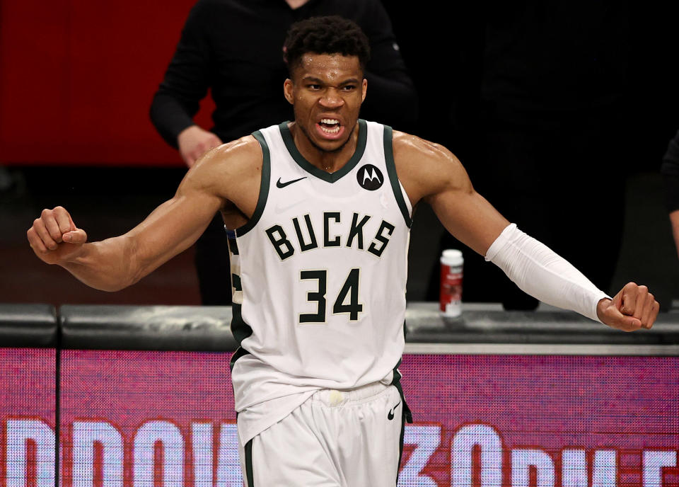 Giannis Antetokounmpo had a huge game to lead the Bucks to the Eastern Conference Finals. (Photo by Elsa/Getty Images)