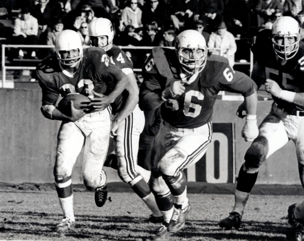 Lineman Irv Goode (55), who played for the Cardinals, Bills and Dolphins in his NFL career, won his only championship with Miami.