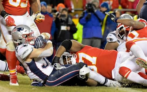New England Patriots running back Rex Burkhead (34) scores the game-winning touchdown during overtime against the Kansas City Chiefs in the AFC Championship game at Arrowhead Stadium - Credit: USA TODAY