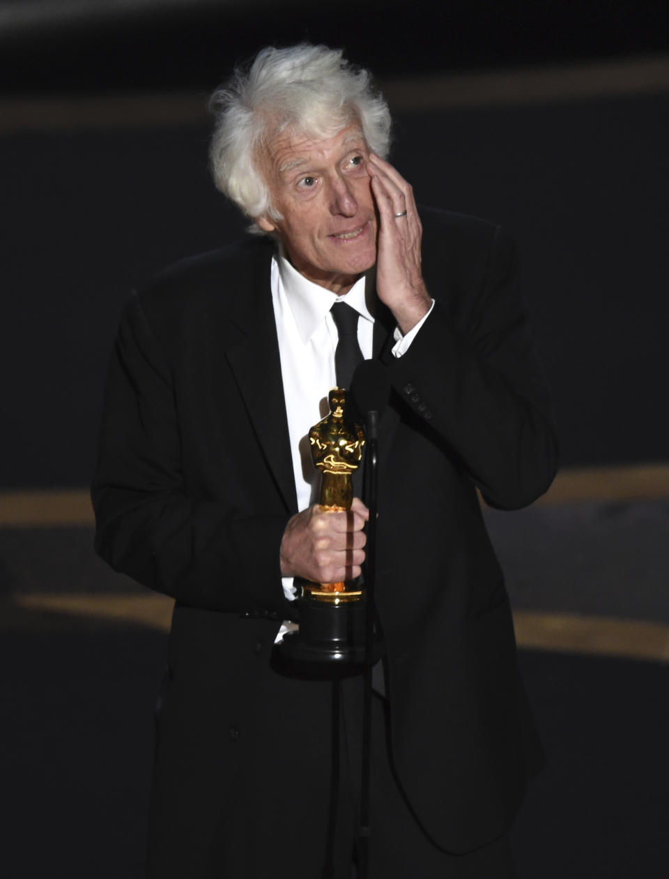 FILE - Roger Deakins accepts the award for best cinematography for "1917" at the Oscars on Feb. 9, 2020, in Los Angeles. His podcast with his wife, James Deakins, is one of the most revealing looks at behind-the-camera film work. (AP Photo/Chris Pizzello, File)