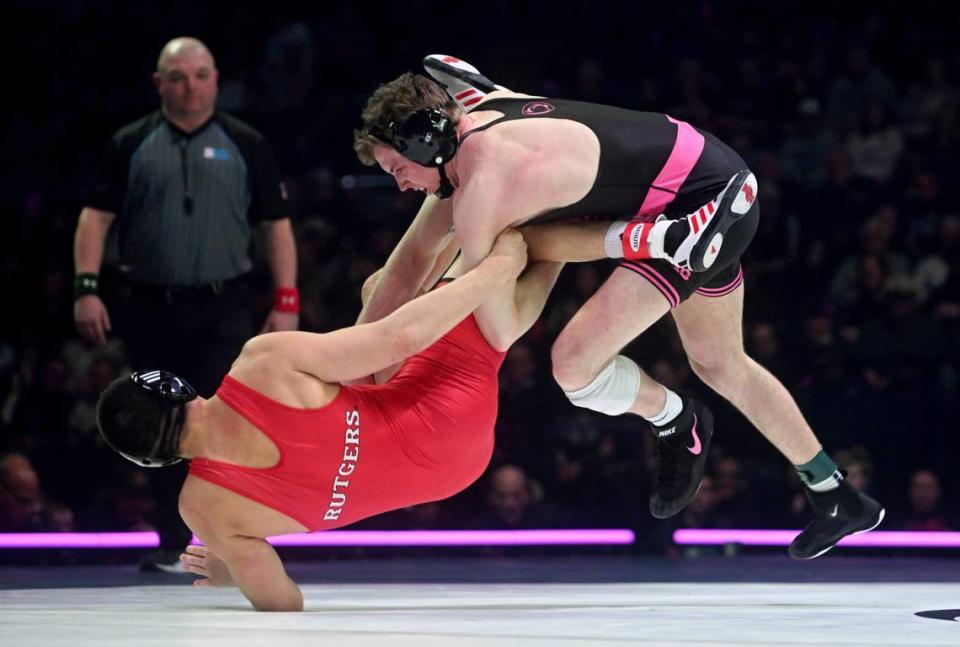 Penn State’s Bernie Truax trips up Rutgers’ Shane Cartagena-Walsh in the 184 lb bout of the match on Monday, Feb. 12, 2024 at the Bryce Jordan Center.