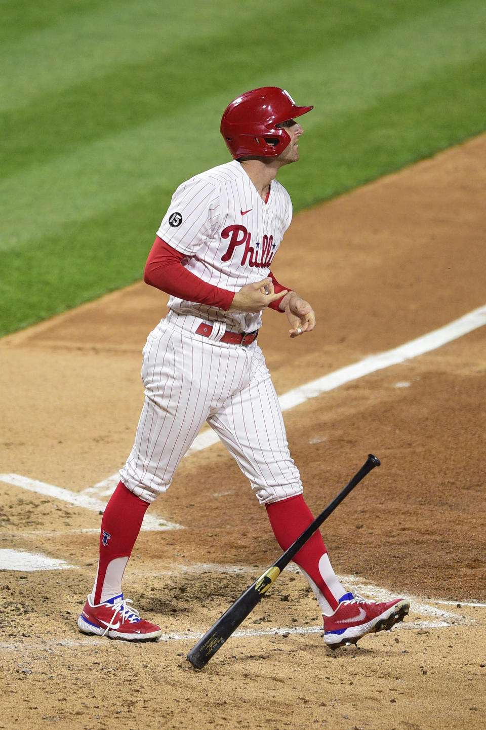 Philadelphia Phillies' Brad Miller watches the ball after hitting a three-run home run off Milwaukee Brewers' Eric Lauer during the third inning of a baseball game, Tuesday, May 4, 2021, in Philadelphia. (AP Photo/Derik Hamilton)