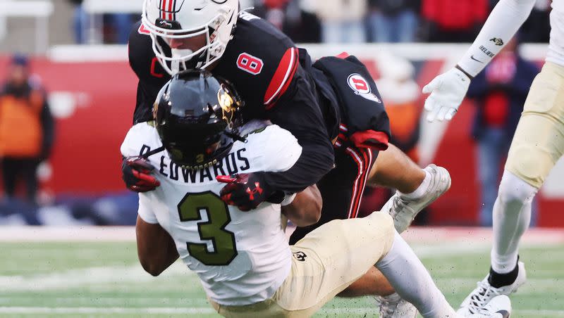 Utah Utes safety Cole Bishop tackles Colorado running back Dylan Edwards (3) in Salt Lake City on Saturday, Nov. 25, 2023. Bishop is one of three Utes who will be participating in Saturday’s Senior Bowl in Mobile, Alabama.