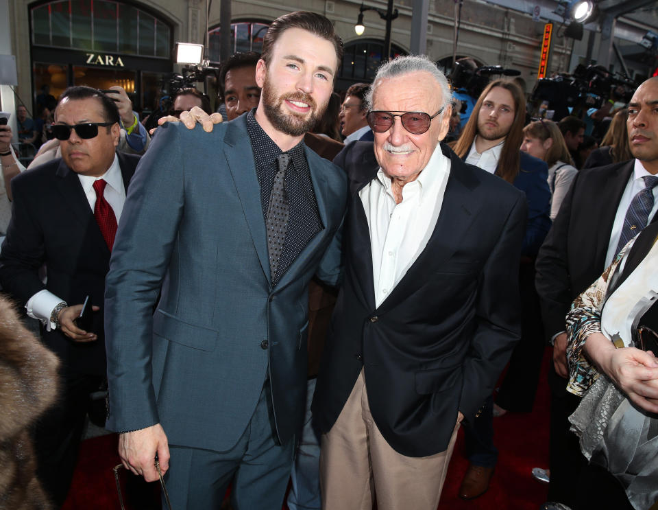 Chris Evans, left, and Stan Lee arrive at the Los Angeles premiere of "Captain America: Civil War" at the Dolby Theatre on Tuesday, April 12, 2016. (Photo by Matt Sayles/Invision/AP)