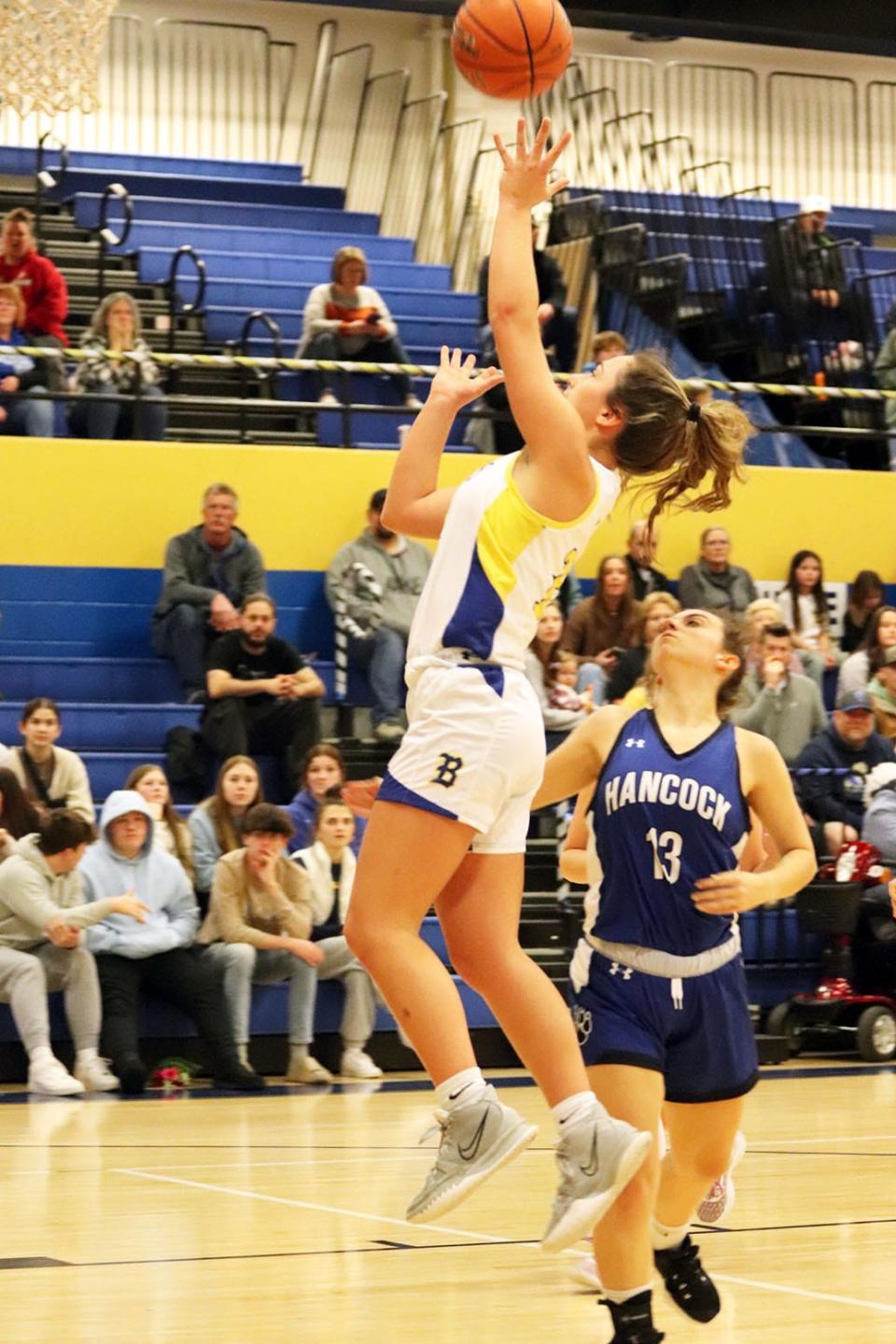 Clear Spring's Alyssa Fisher puts the ball up for two of her 12 points in the Blazers' 55-17 win over Hancock on Monday.