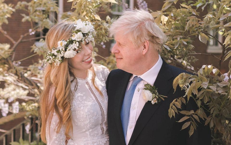 Boris and Carrie Johnson - Rebecca Fulton/Pool via REUTERS/File Photo