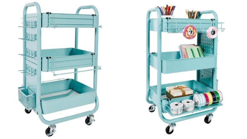 Add a pop of color to your home with this teal metal cart.