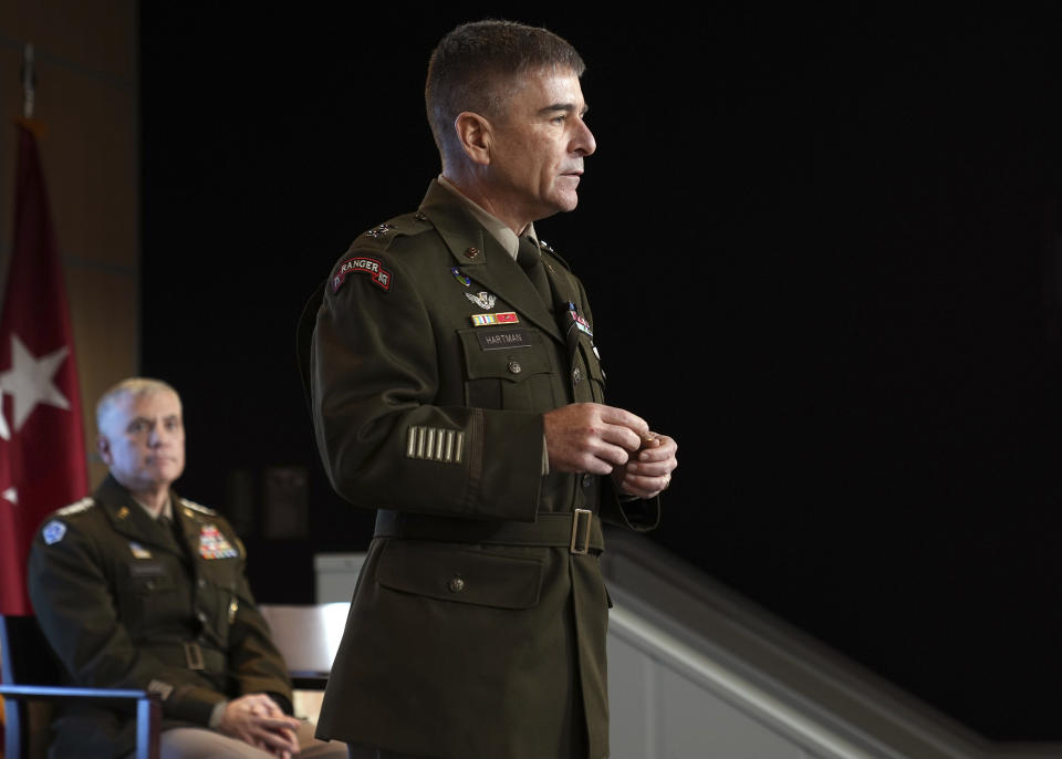 In this image provided by U.S. Cyber Command, Army Maj. Gen. William Hartman, who leads the U.S. Cyber National Mission Force, speaks during a ceremony at U.S. Cyber Command headquarters at Fort George E. Meade, Md., Monday, Dec. 19, 2022. (U.S. Navy Chief Petty Officer Jon Dasbach/U.S. Cyber Command via AP)