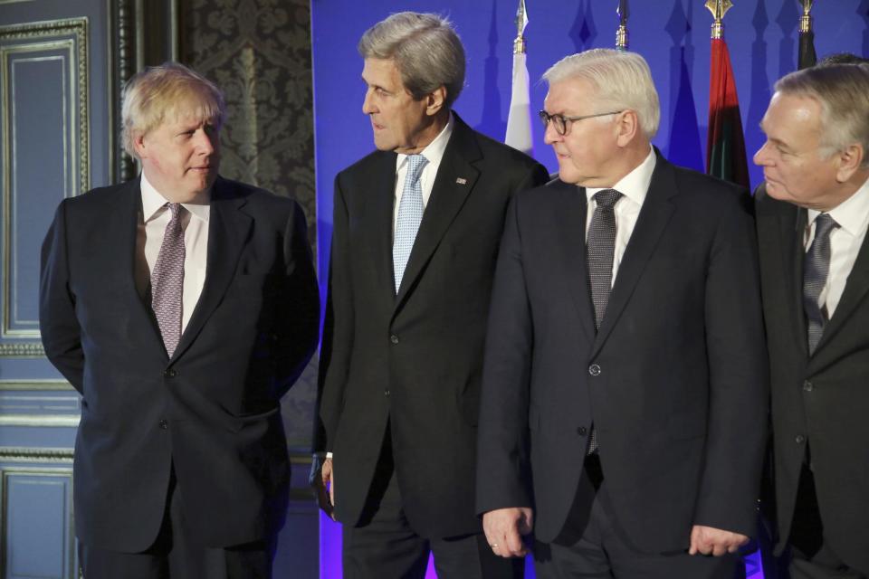 From left; British Foreign Secretary Boris Johnson, U.S. Secretary of State John Kerry, German Foreign Minister Frank-Walter Steinmeier, and French Foreign Minister Jean Marc Ayrault talk during a family picture prior to a meeting in Paris, Saturday, Dec. 10, 2016. Kerry and leading diplomats are trying to find solutions for Syria's desperate opposition as Syrian government forces squeeze rebels out of Aleppo after a devastating blitz. (AP Photo/Thibault Camus, Pool)