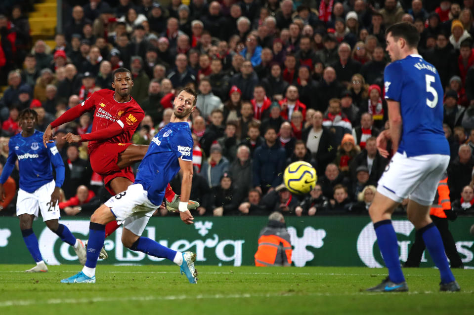 LIVERPOOL, ENGLAND - DECEMBER 04: Georginio Wijnaldum of Liverpool scores his team's fifth goal  during the Premier League match between Liverpool FC and Everton FC at Anfield on December 04, 2019 in Liverpool, United Kingdom. (Photo by Clive Brunskill/Getty Images)