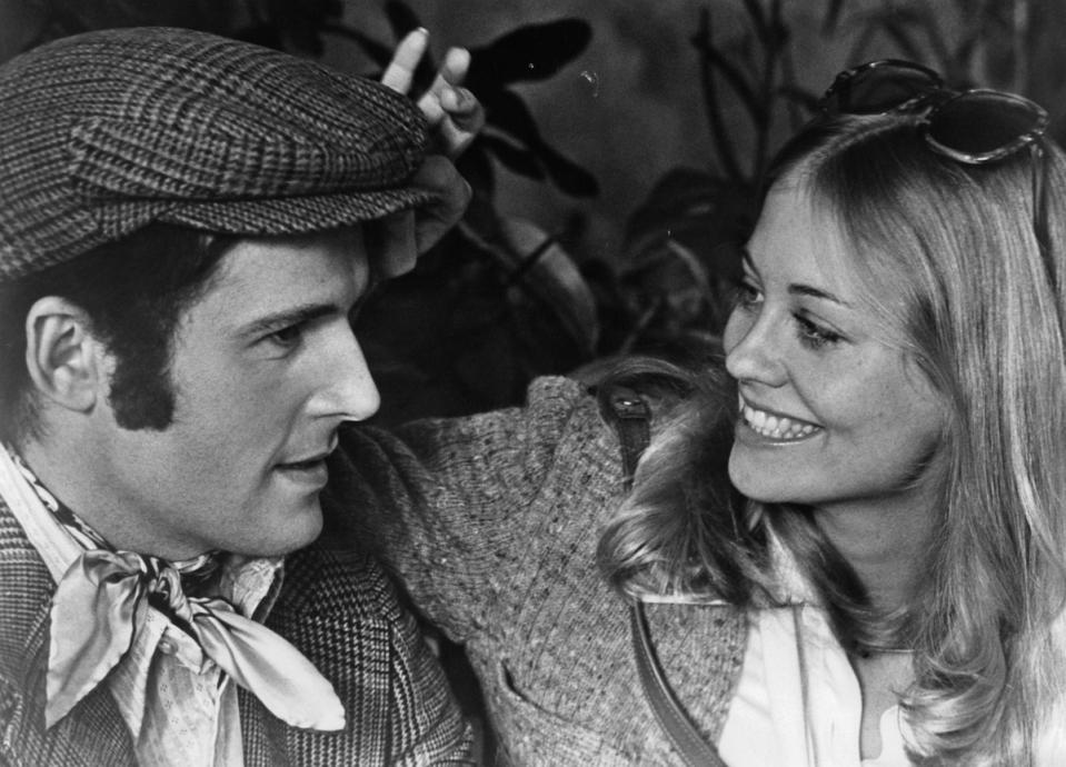 Cybill Shepherd with her arm around Charles Grodin in a scene from the film 'The Heartbreak Kid', 1972