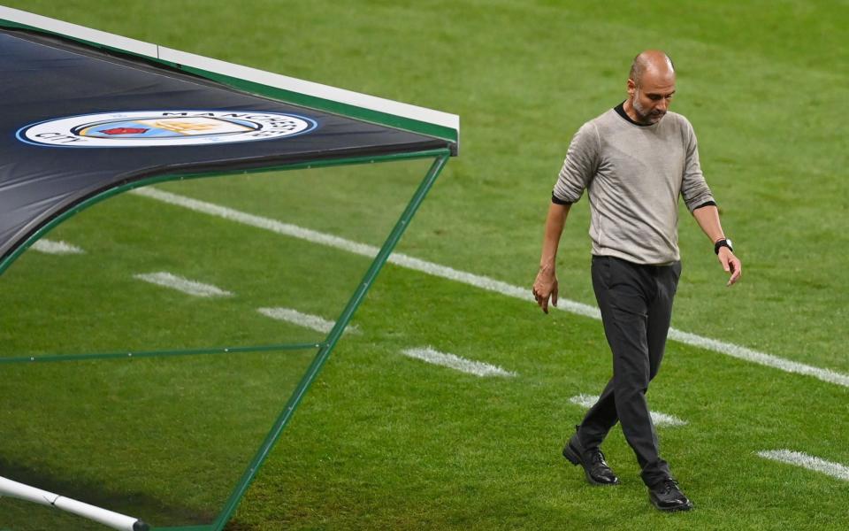 Pep Guardiola, Manager of Manchester City looks dejected during the UEFA Champions League Quarter Final match between Manchester City and Lyon at Estadio Jose Alvalade on August 15, 2020 in Lisbon, Portugal. - GETTY IMAGES